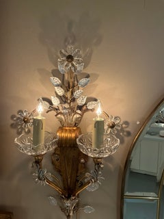 Set of four crystal and metal wall sconces in the bagues style