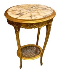 Fine French Giltwood side table in oval shape