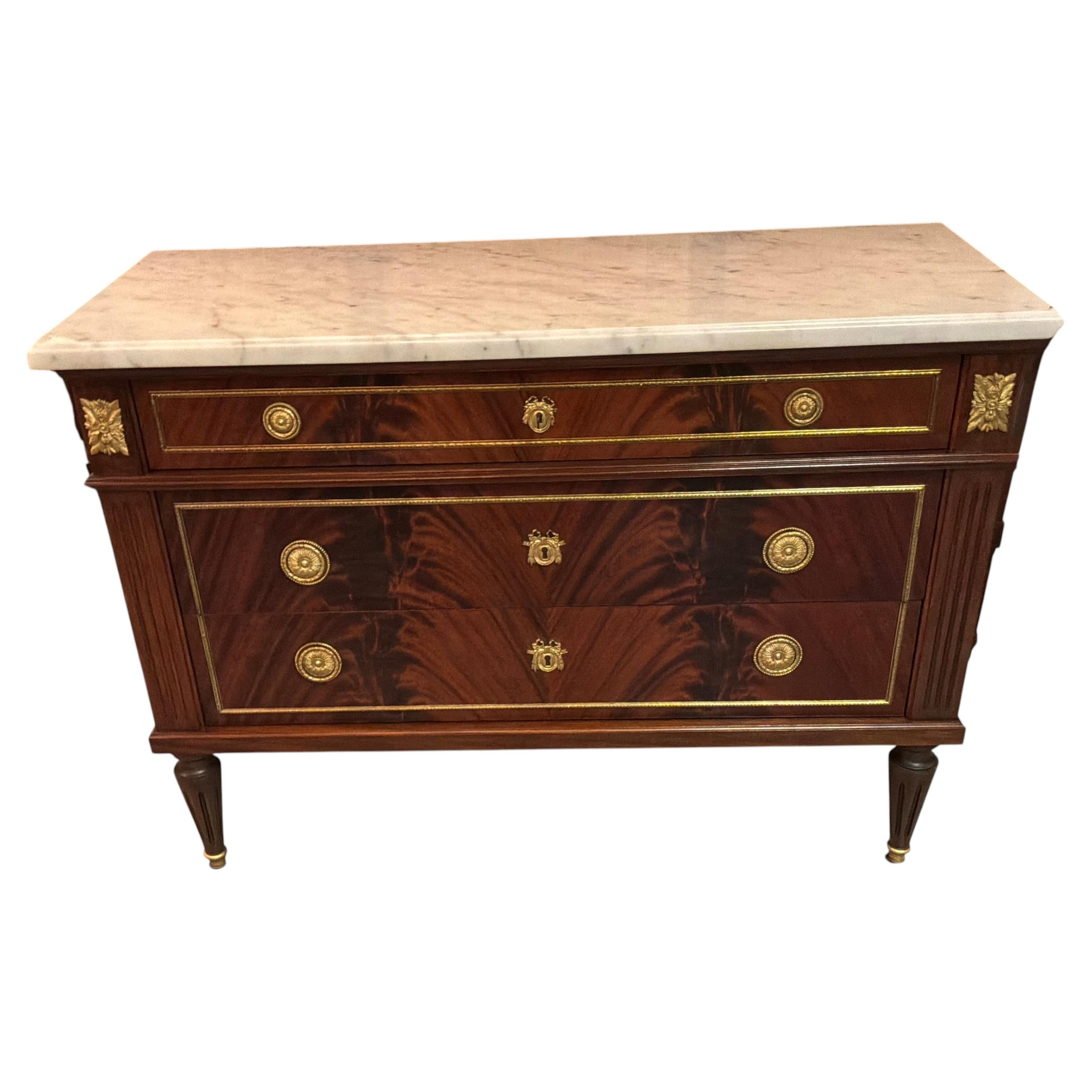 French Louis XVI style chest/ commode 19 th c. Mahogany with marble top For Sale
