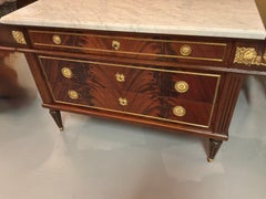 French Louis XVI style chest/ commode 19 th c. Mahogany with marble top