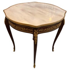 French Louis XV style table with gilt bronze mounts and white marble top