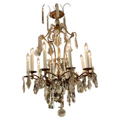 French chandelier with gilt bronze, clear and rock crystal.