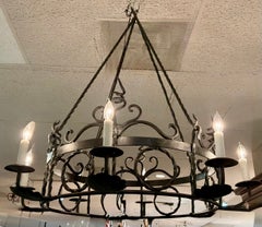 Large iron chandelier with eight lights mid century