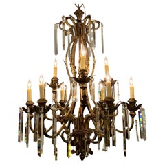 Large gilt iron and crystal chandelier with nine lights