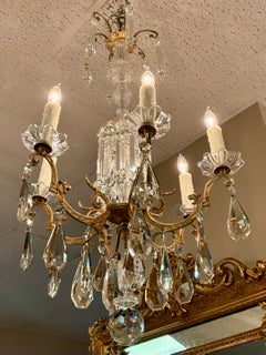 French six light bronze and crystal chandelier