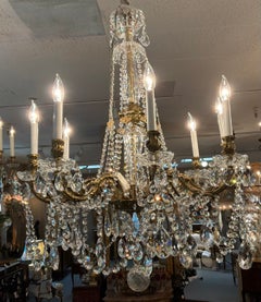 French bronze and crystal eight light chandelier