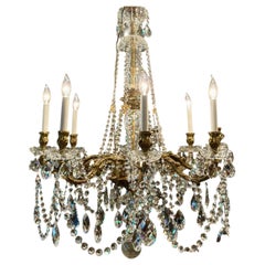 French bronze and crystal eight light chandelier