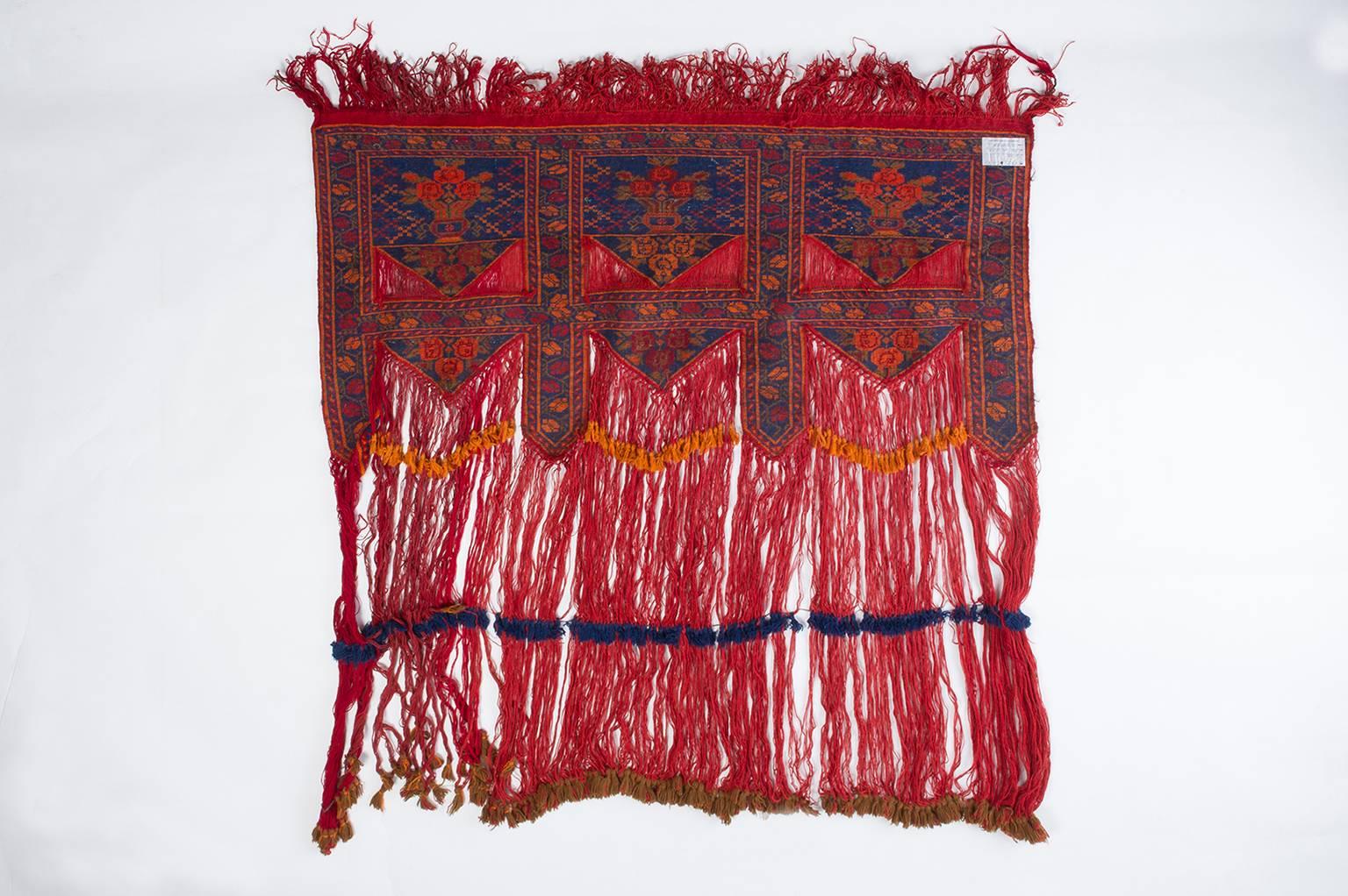 Vintage above door nomad tent, named Kapunnuk. It has never been used, therefore its long fringes are still tied together: it had probably been woven (together with another one published) to be a wedding gift, or it had been woven by the bride for