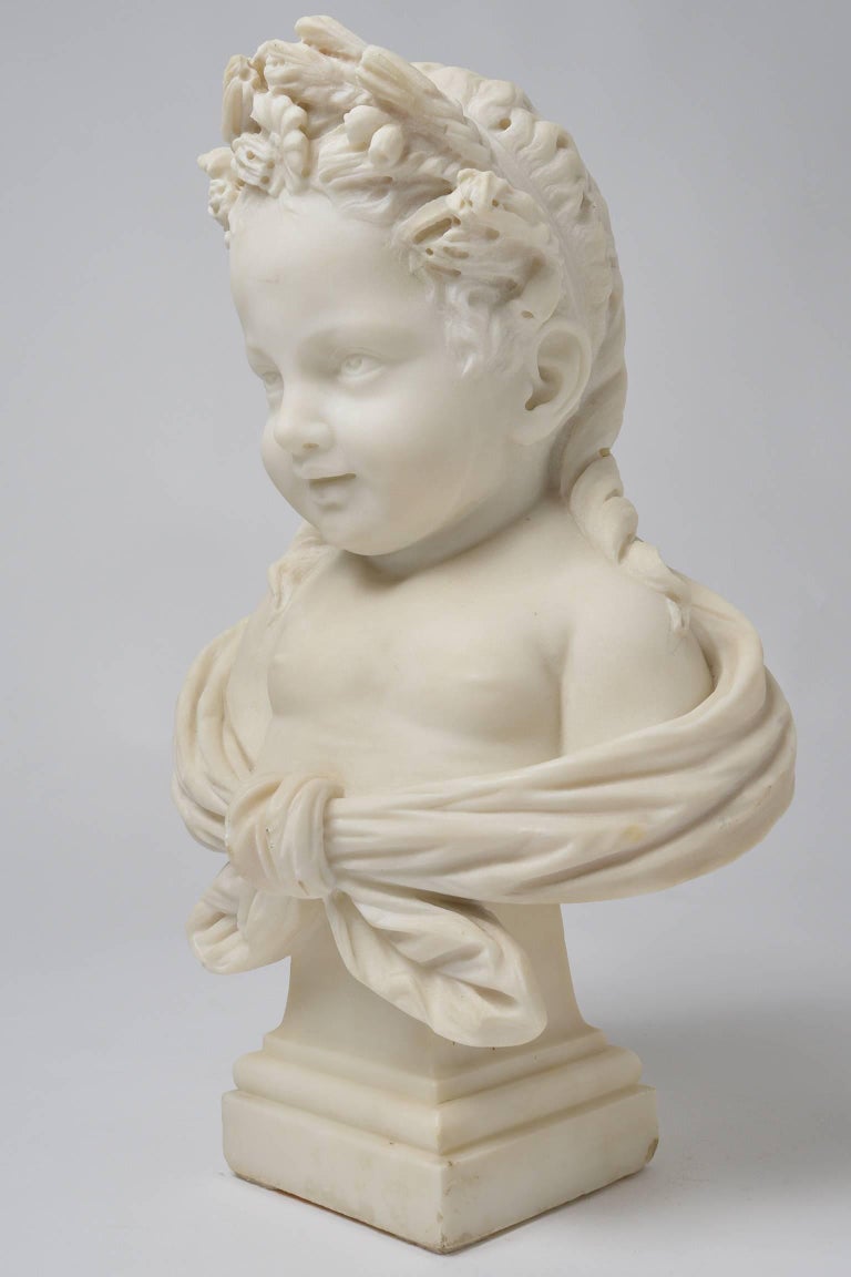 Wonderful white marble statue of a smiling sweet little girl, with flowers in the hair. a very unusual marble statue .
nr. O/7552.