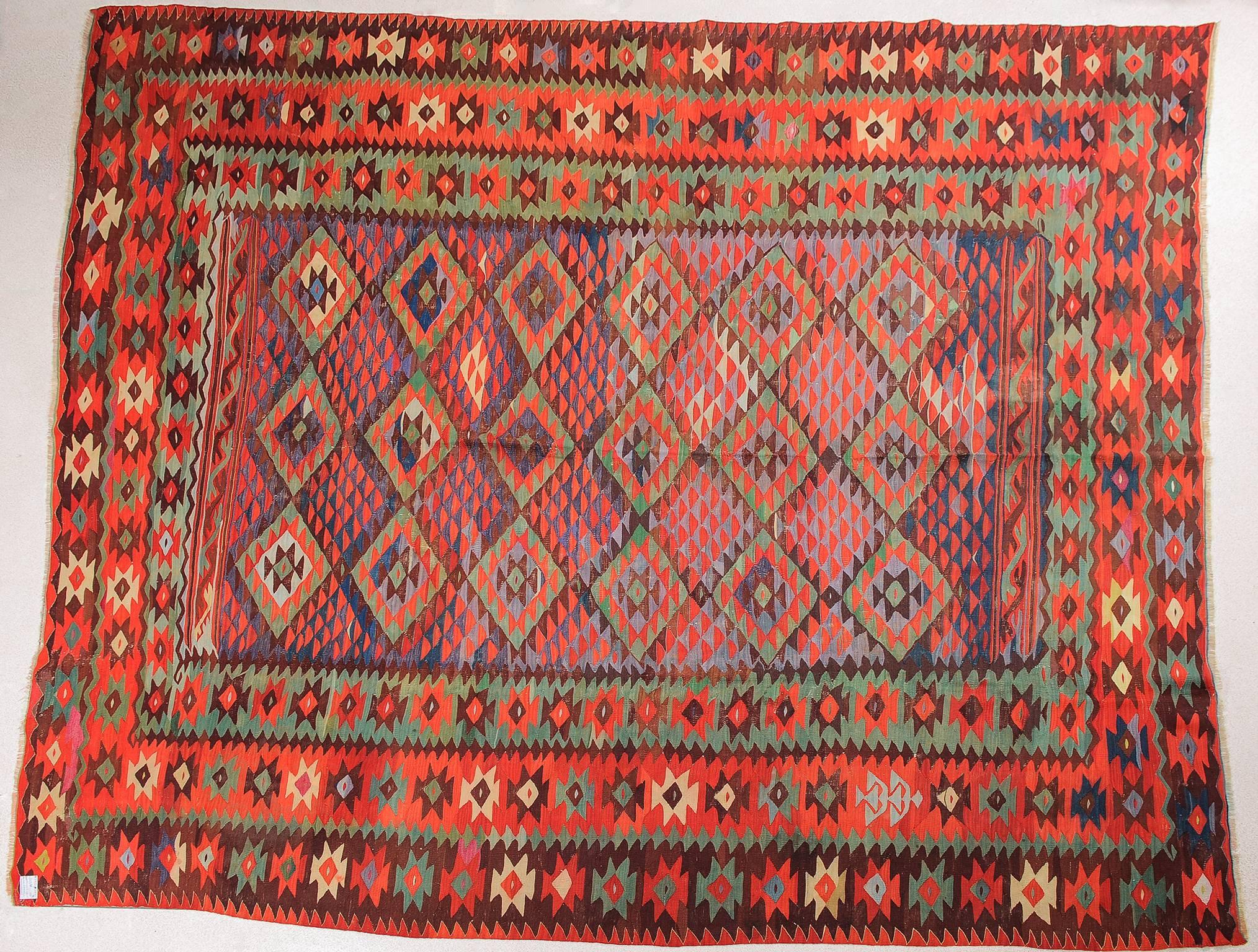 SHARKOY is the name given by Turks to the town of PIROT, in the border region between Serbia and Bulgaria. Once part of the Ottoman Empire, this area has a long tradition of producing large kilim rugs, very finely woven, favored as summer carpets in