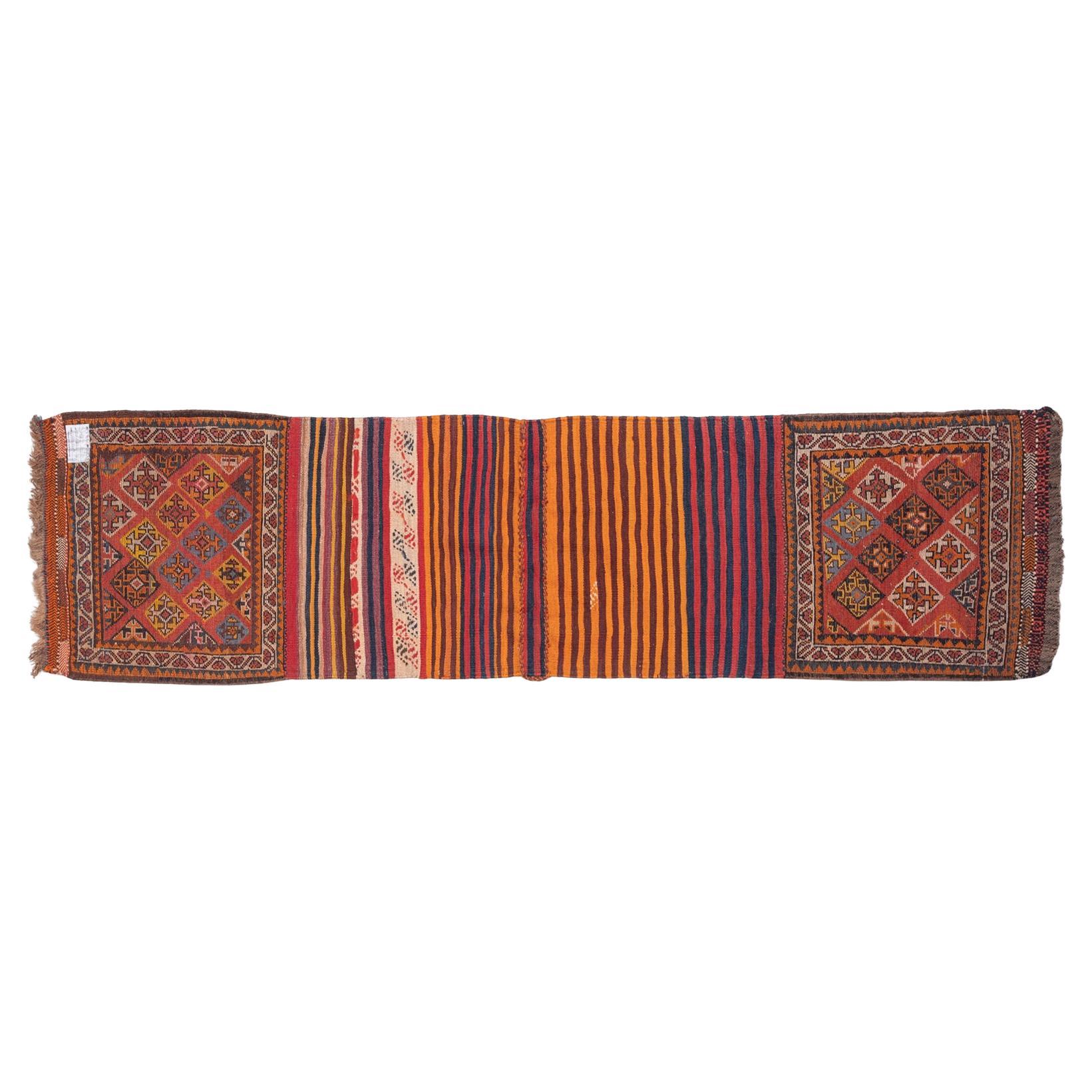 Oriental little runner, loom woven with wool , dyed with vegetable substances.
It can be hung on a wall or placed on floor. 
 It's perfect for the bedroom or in front of a bookcase or hanging.

Ref. Nr. 894.