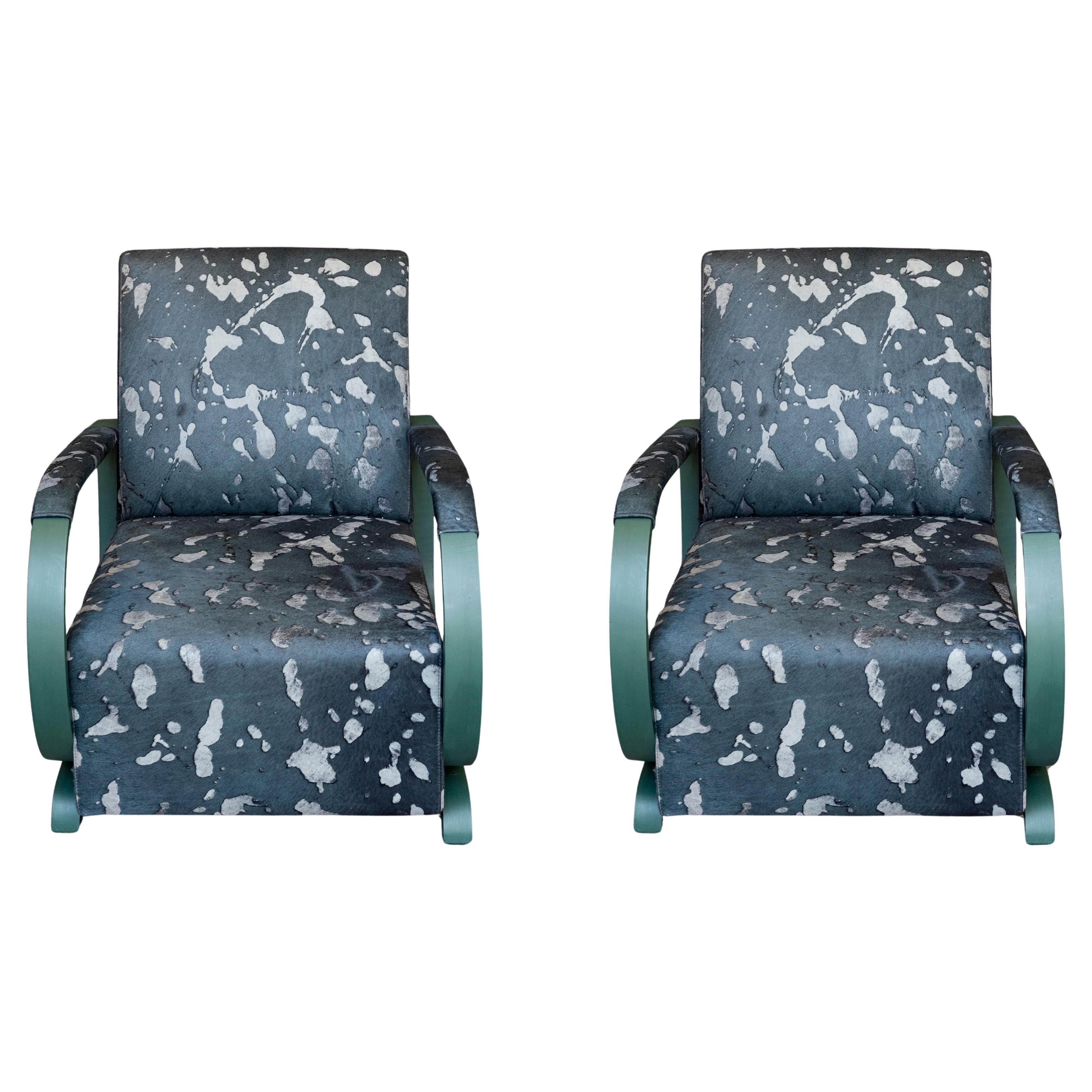 Pareja de sillones Art Déco Club de cuero verde