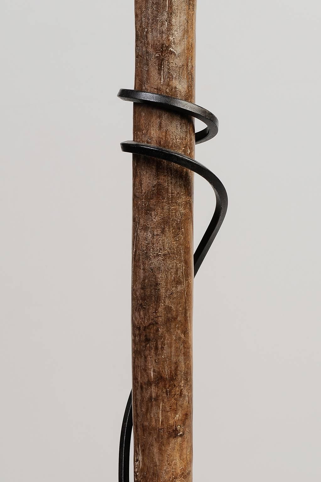 Old Berber Tuareg tent poles, on iron bases: to make of this raw object a true object of art, with a story, as always.
O/5452 -