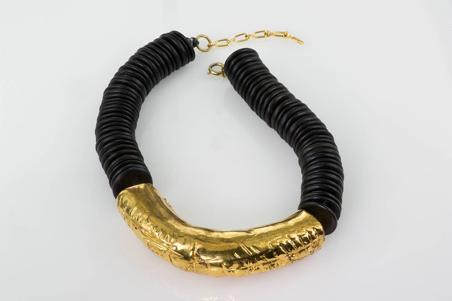 Necklace completely handmade with terracotta in a gold bath and diskettes ebony. Designed by Emilia Palomba -