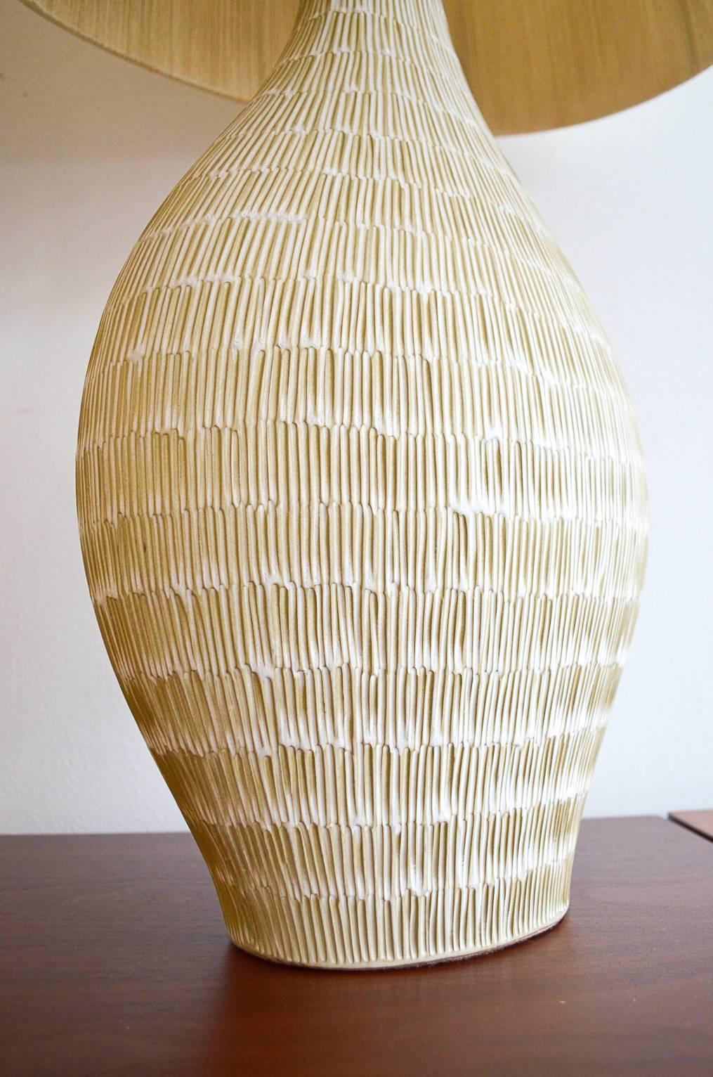 Pair of Incised Cream Ceramic Lamps with Original String Shades In Excellent Condition In Costa Mesa, CA