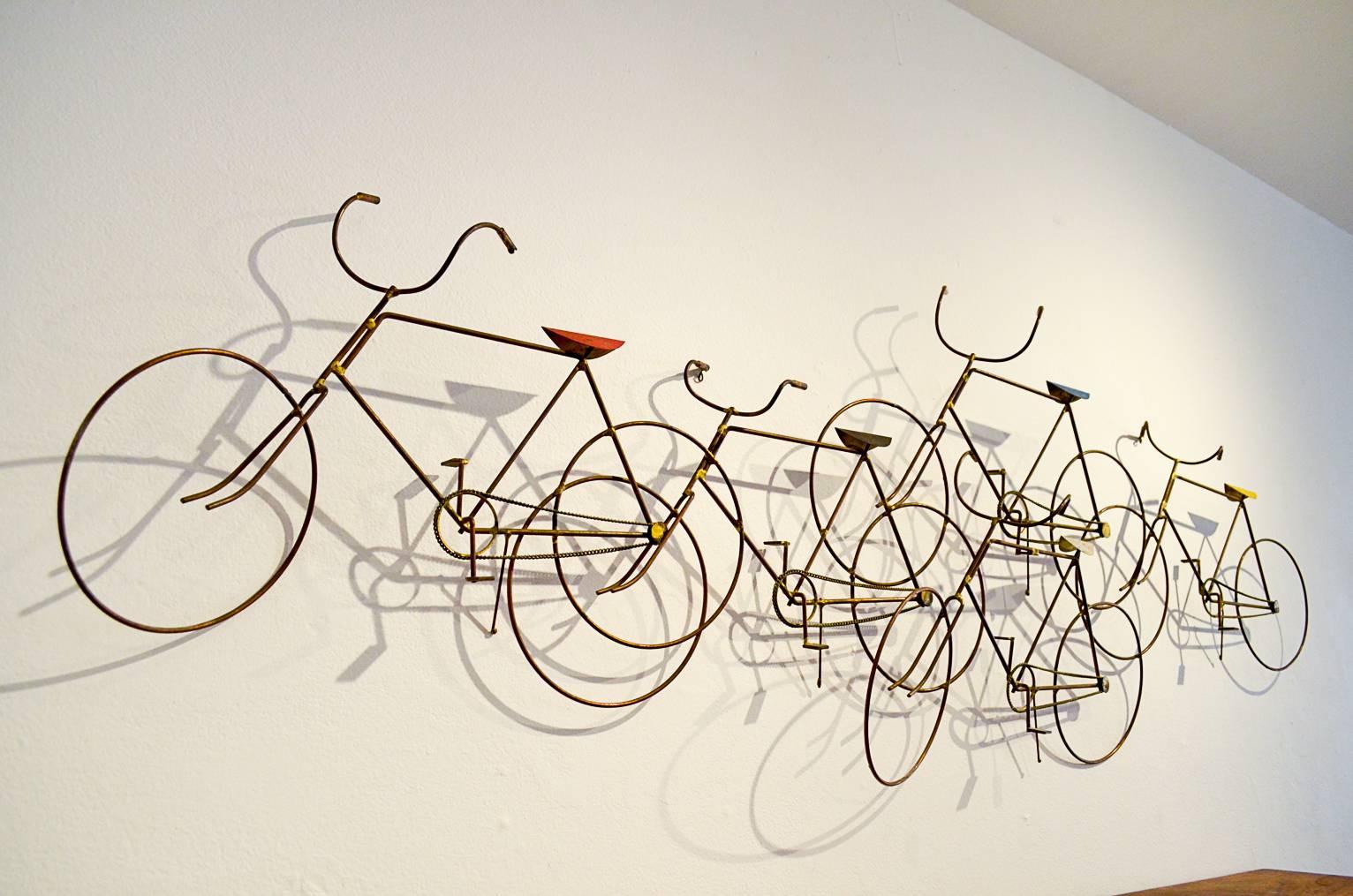 Original bicycle sculpture by C. Jere for Artisan House. Signed and dated '72.

Original finish with nice patina, colored seats. Perfect for the bicycle enthusiast in your home.

Measures 61