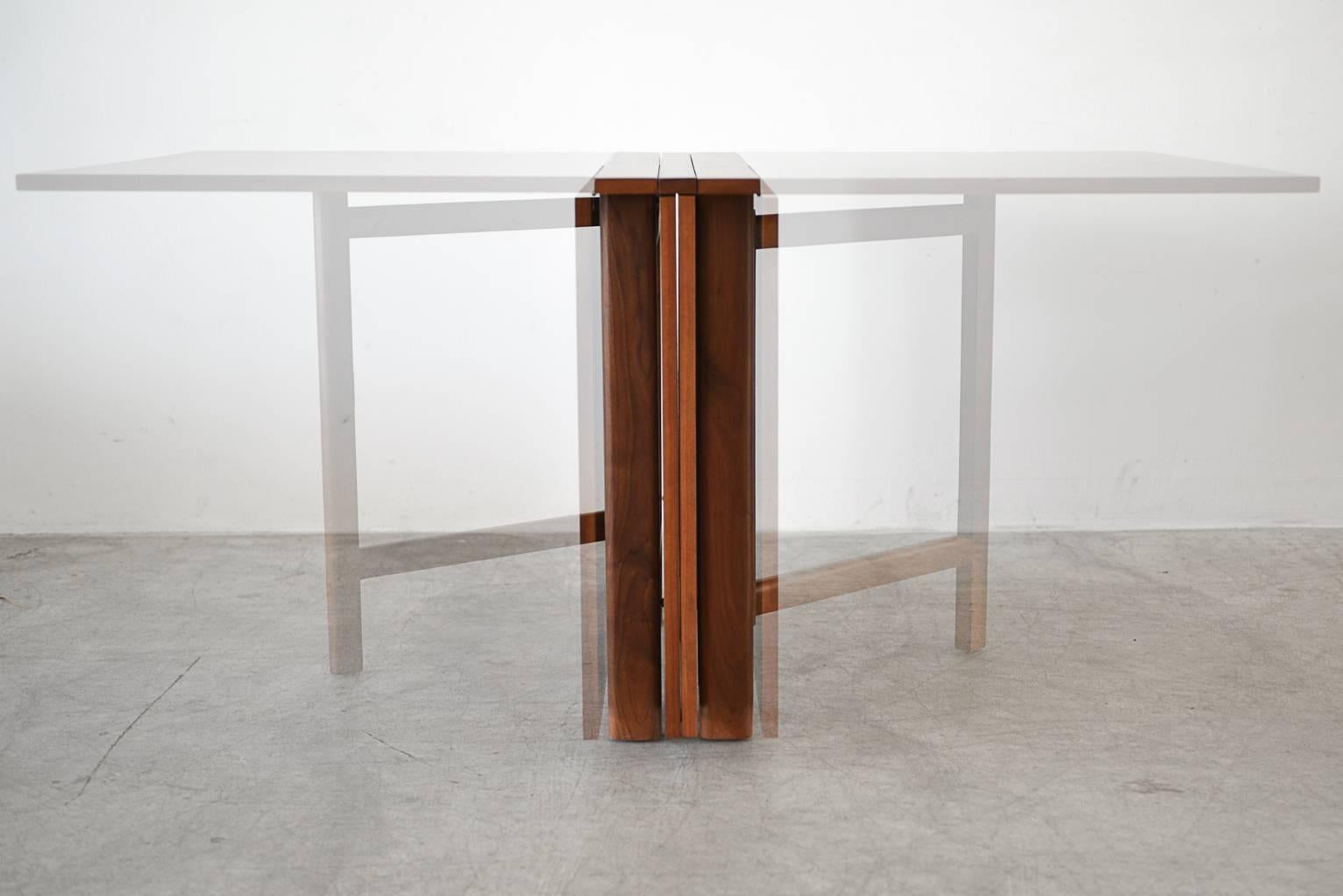 Teak expandable gate leg dining table by Bruno Mathsson. Expands up to 110