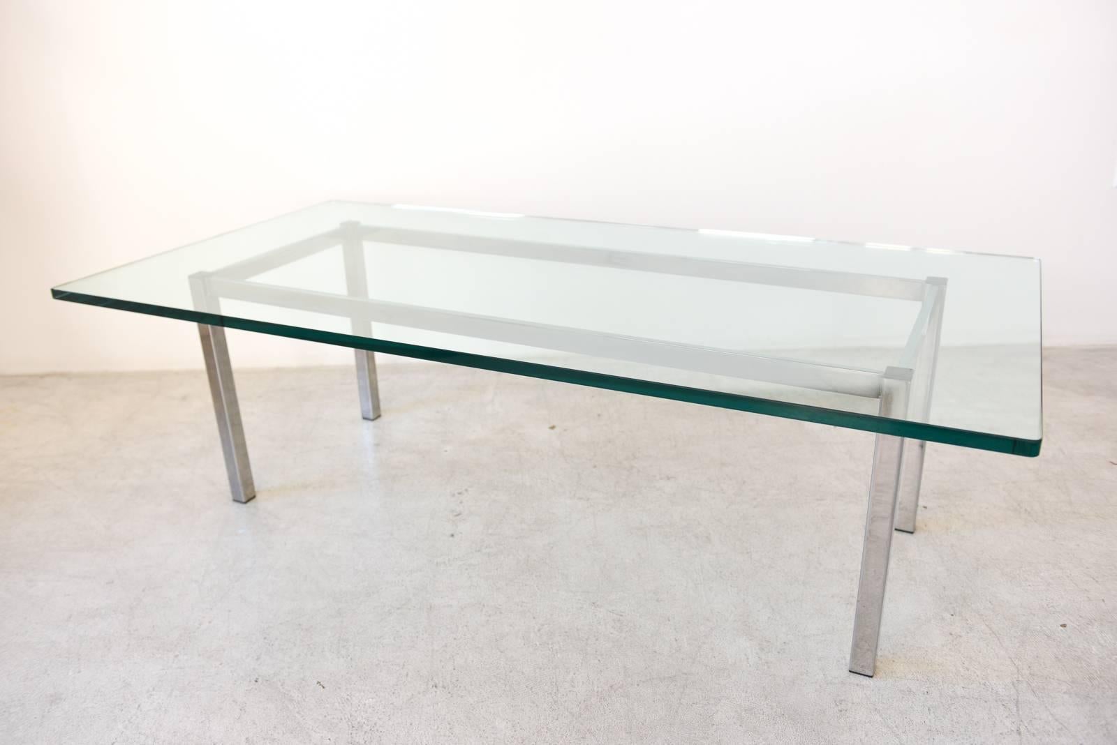 Custom-made chrome and glass rectangular coffee table with heavy, thick beveled glass. Excellent condition.

Measures: 56