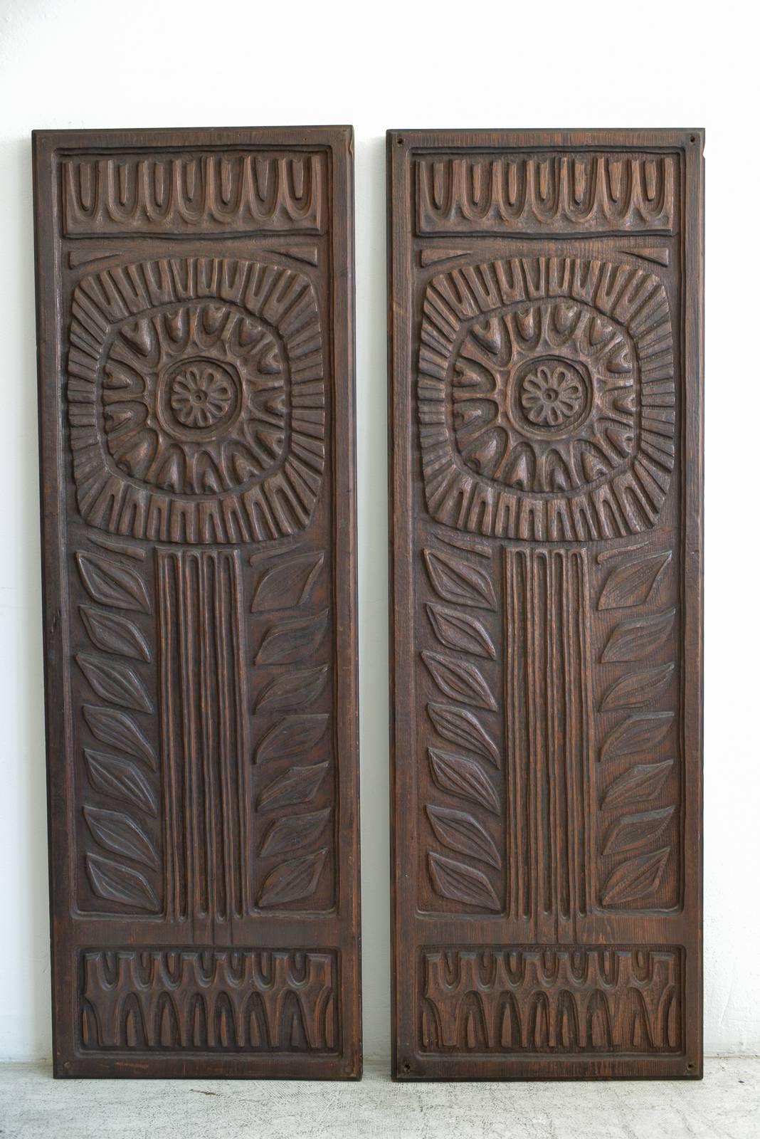 Pair of large-scale Evelyn Ackerman wood panels, 'Flower', circa 1960

Heavy, large-scale panels that can be used as building or architectural elements or wall hangings. Solid redwood in very good condition, mounting holes in one panel, see