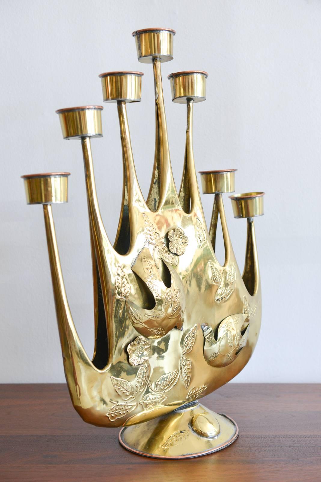 Rare and beautiful brass plated Brutalist tin candelabra by Mexican artist Gene Byron. Handmade of hand-hammered tin with lovely detail, this beautiful piece was also featured in the Verna Cook Shipway Mexican modernism design books of the 1960s.
