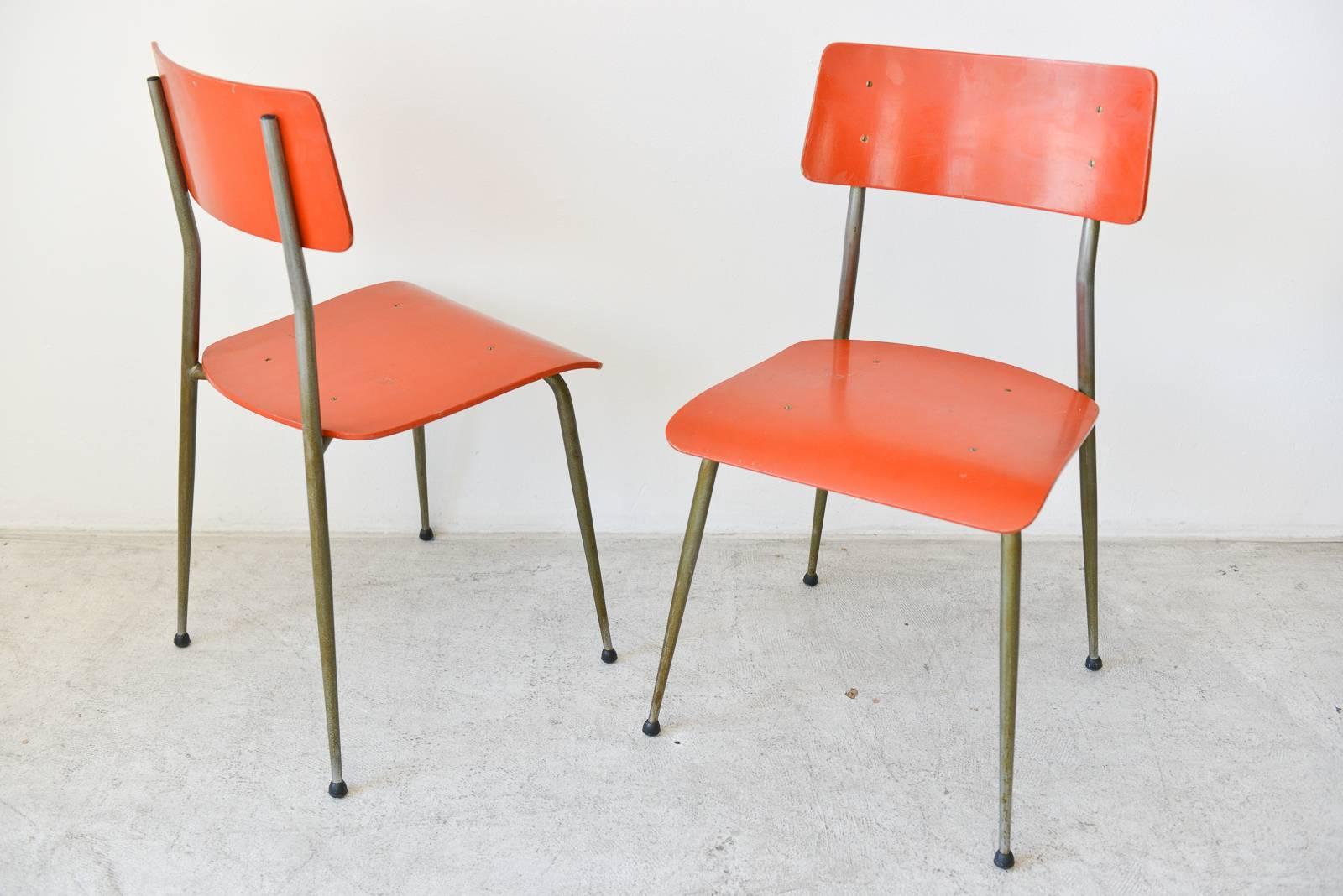 Vintage French child's table and chair set, circa 1950. Original dark orange enamel finish with great patina on legs. Very good condition, some small chips in paint on table, as shown in photo 10, otherwise very good.

Table measures 30