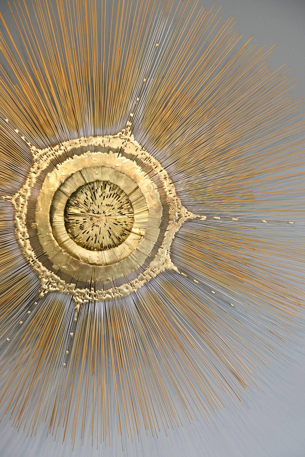 Large-scale Brutalist kinetic sunburst wall sculpture by artist Frederick Prescott, 1976. gilded brass with three concentric layers featuring great depth and character. Excellent original condition, one owner piece from Southern California estate.
