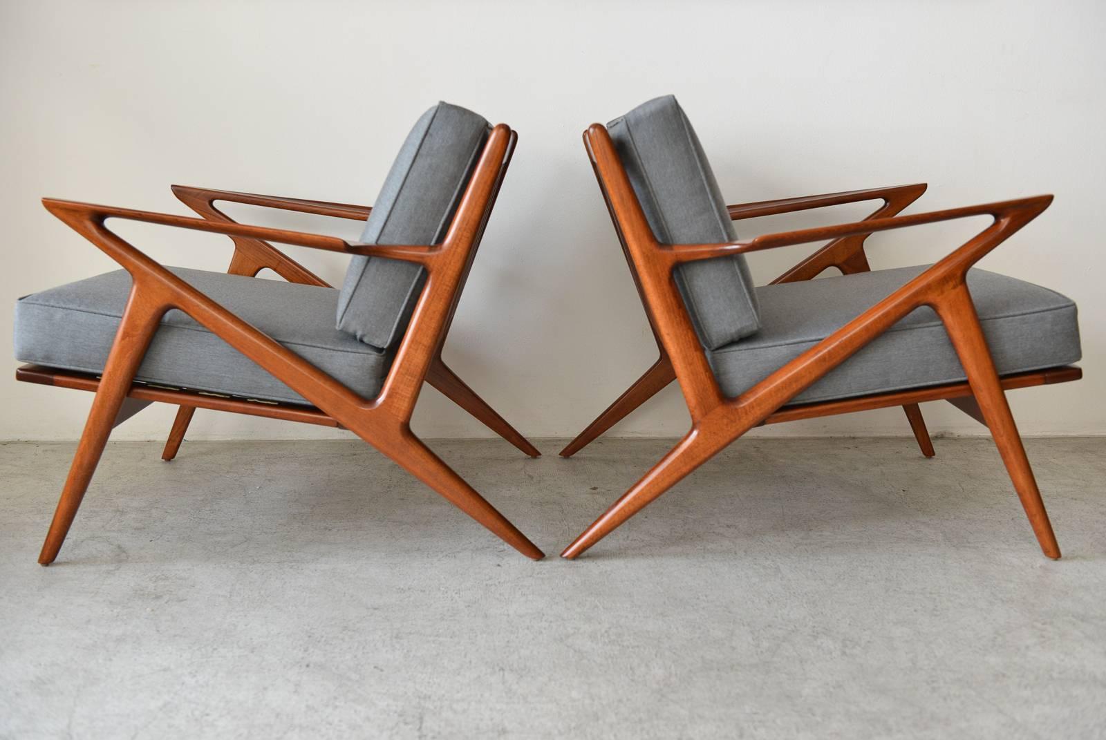 Pair of original Poul Jensen 'Z' Chairs by Selig, circa 1960. Fully restored in showroom condition with beautiful tailored grey cushions. Classic and iconic style, beautiful quality and timeless design.  Both with original Selig emblems on