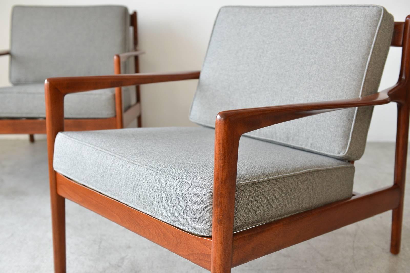 Mid-20th Century Pair of Walnut Lounge Chairs by Folke Ohlsson for DUX, Sweden, circa 1960