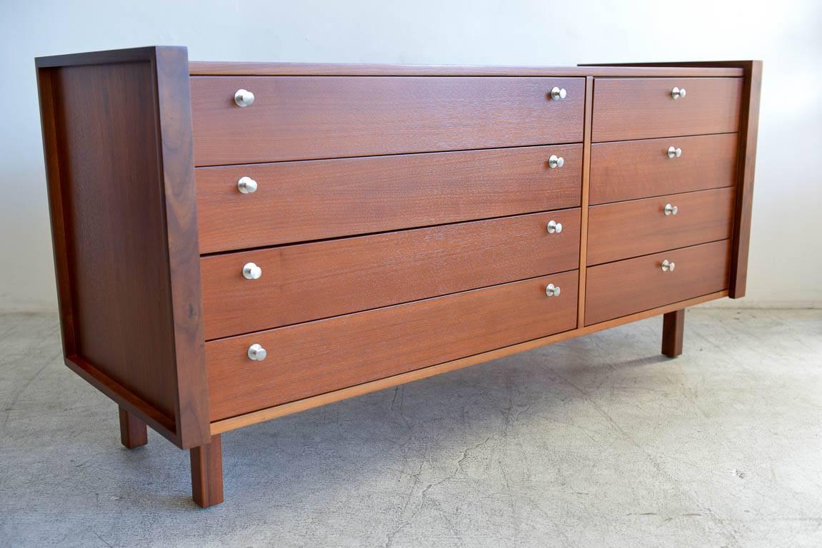 Martin Borenstein for Brown Saltman modular walnut dresser or credenza, circa 1960. Beautiful walnut grain with original hardware. Professionally restored in showroom perfect condition. Rare pieces, hard to find with walnut finish. Matching small