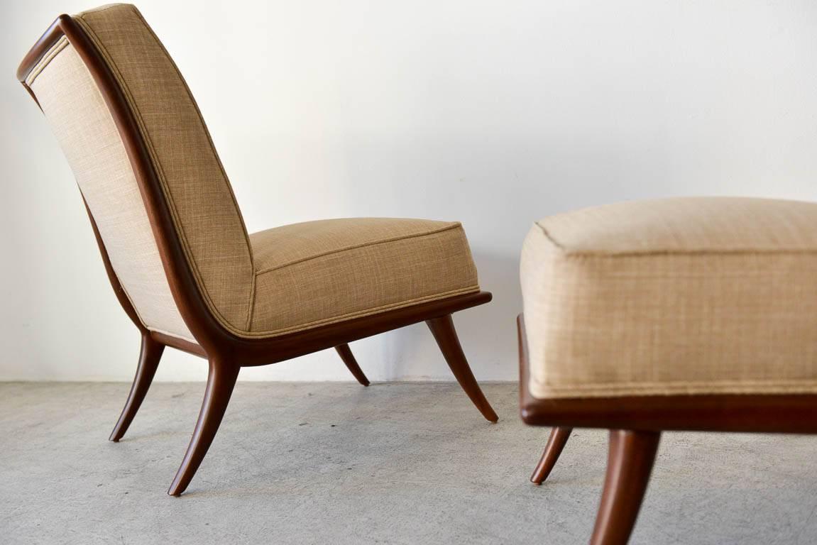 Mid-20th Century Pair of T. H. Robsjohn-Gibbings Walnut Sabre Leg Slipper Chairs, circa 1950