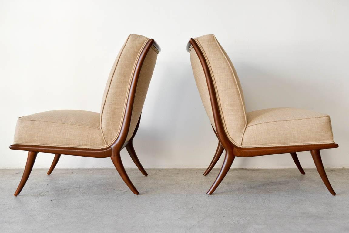 Mid-Century Modern Pair of T. H. Robsjohn-Gibbings Walnut Sabre Leg Slipper Chairs, circa 1950