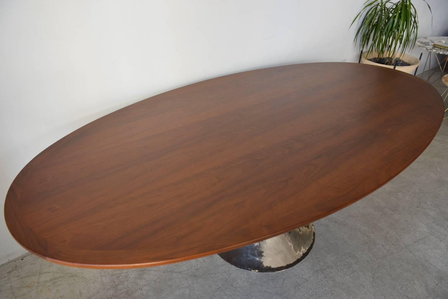 oval dining table with pedestal base