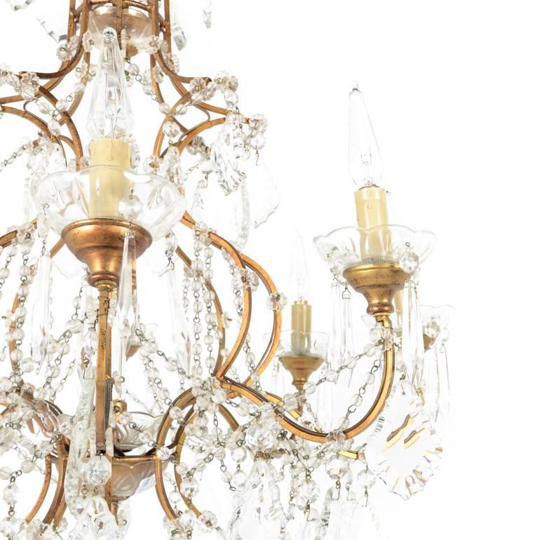 20th Century French birdcage chandelier made in France. Gilt bronze with original crystal and wiring, in excellent condition.

