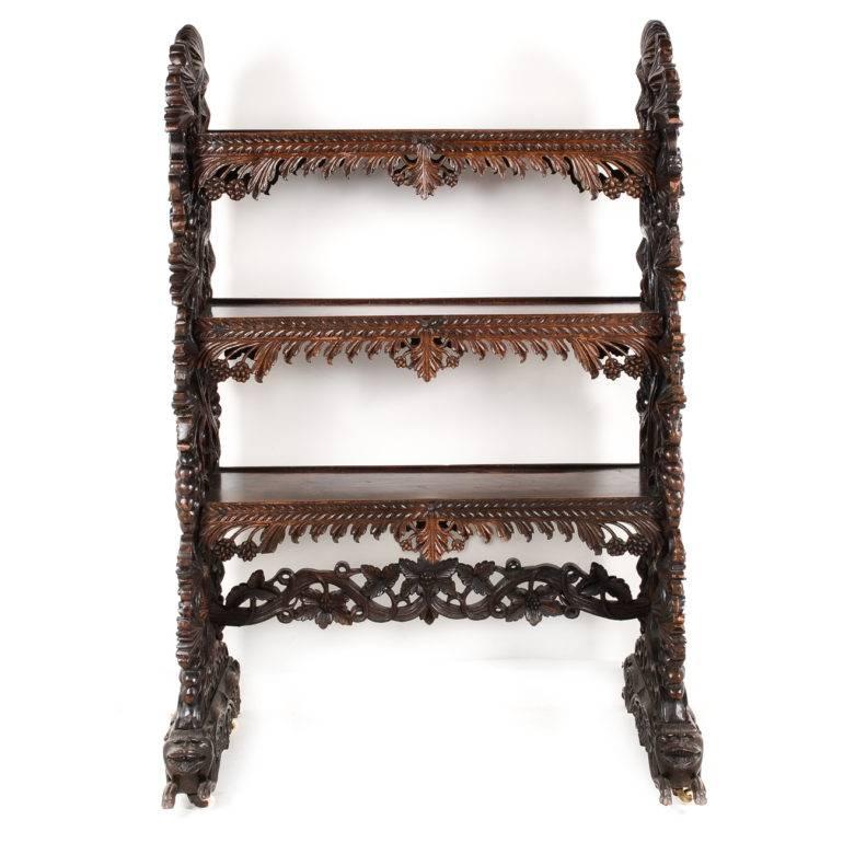 This exquisitely carved Anglo-Indian rosewood etagere dates back to the mid-to-late 19th century. Incredible craftsmanship put into the detailing of this piece with a rich glossy colour.