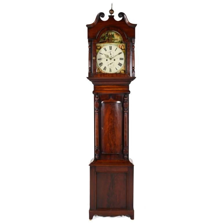 English antique tall-case mahogany grandfather clock, recently serviced and in working condition. The eight-day weight-driven movement keeps time and clock strikes on the hour. Dated “1850 Graham Berwick, London.”