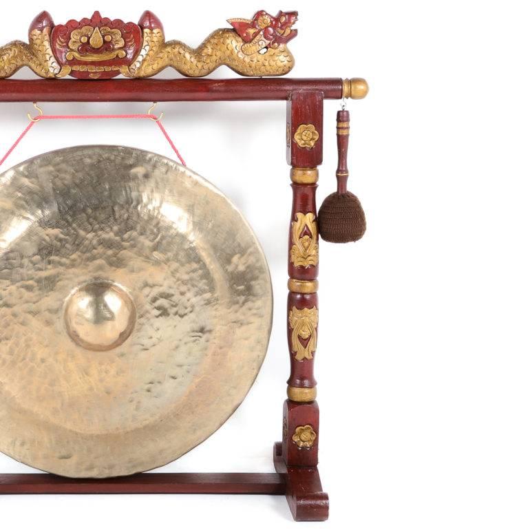 Vintage large Asian bronze gong of immense proportions, with a deep, rich sound. Bronze-and-painted wood on carved stand. Probably ceremonial.

Offers invited.