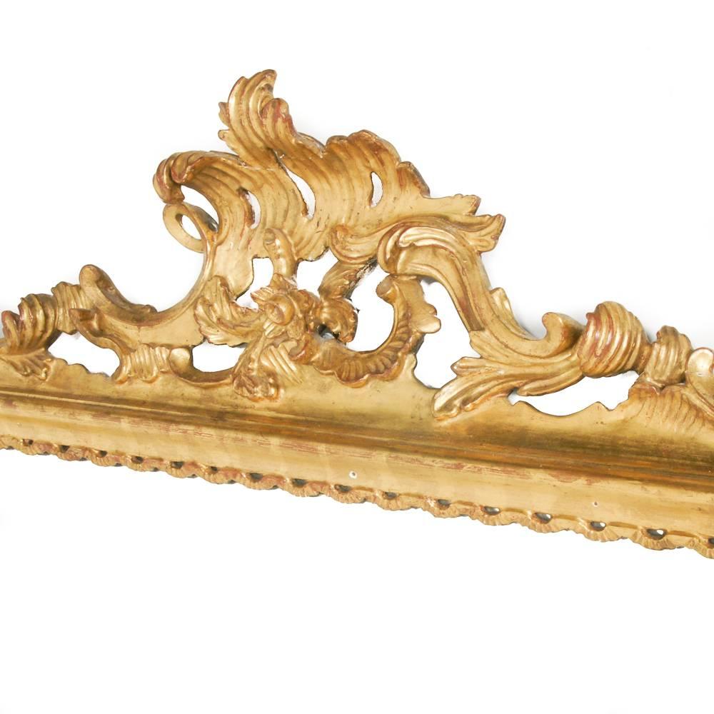 Beautifully detailed Italian carved giltwood mirror.
