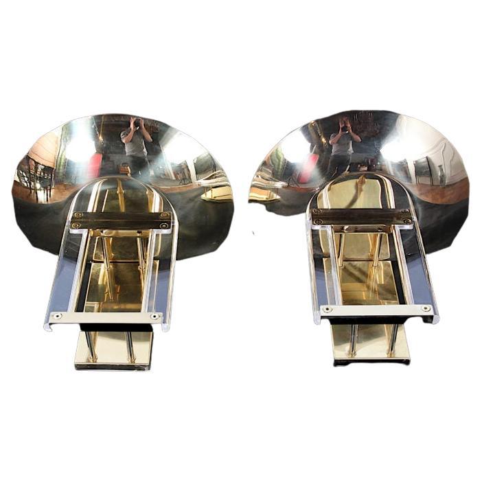 A Signed Pair of Hollywood Regency wall sconces made of brass and Lucite, made by Fredrick Ramond in the 1980s.