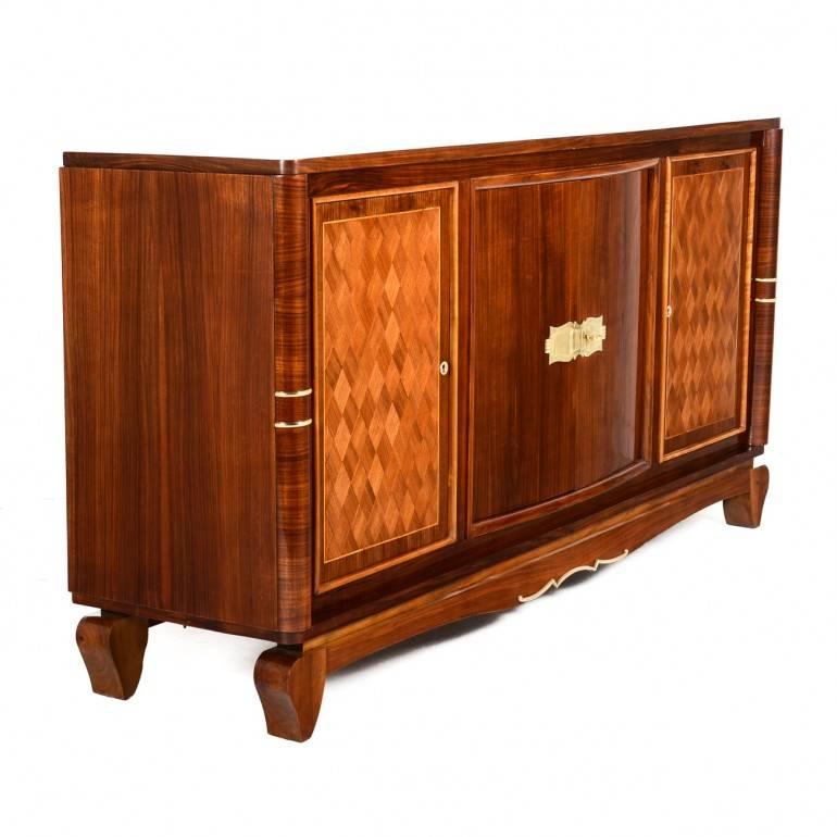 A beautifully restored French Art Deco buffet or enfilade in the manner of Jules Leleu. Created from exotic woods of Macassar ebony and kingwood.
