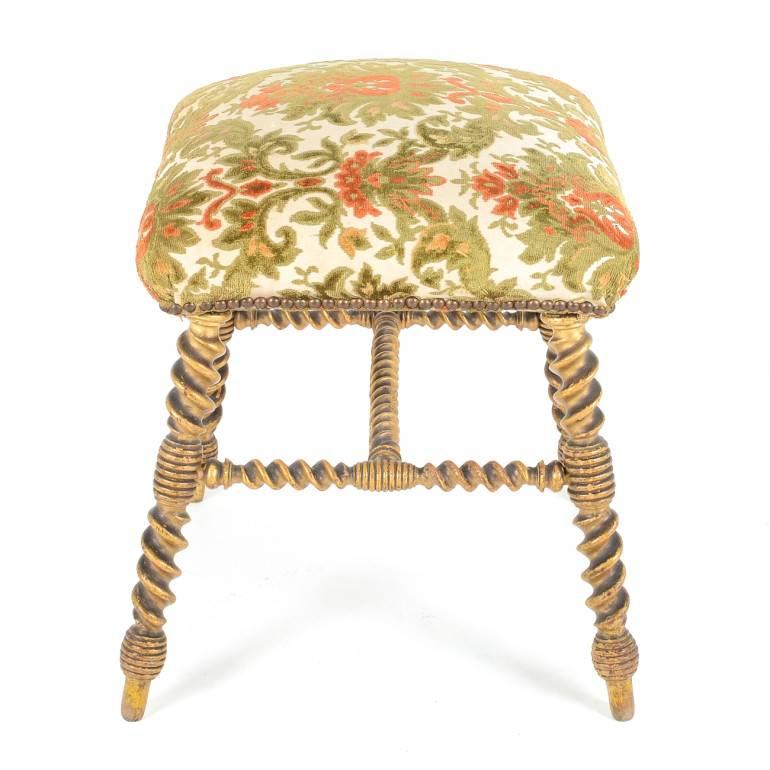 Beautifully detailed French antique hand-carved giltwood stool. From France, Circa 1890.

