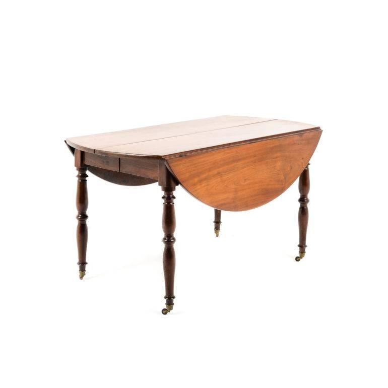 Antique French mahogany dropleaf dining table, Circa 1840. This is a very versatile piece, suitable for smaller spaces, and can be folded to store away easily.


     
   
