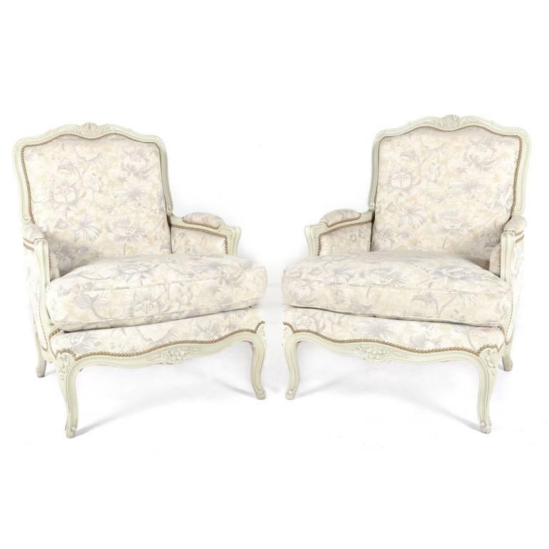 Luxurious and large, Classic Louis XV style French Bergere chairs. Beautiful lines, intimate carvings, and upholstery in excellent condition.
   