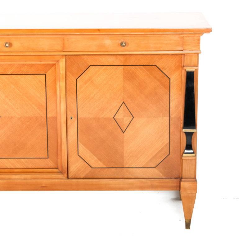 Elegant, Mid-Century French inlaid cherrywood sideboard. Also known as an Empire-style 