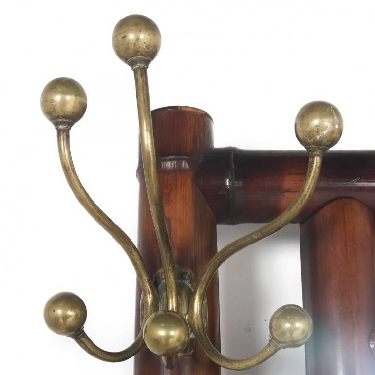 French antique bamboo hallstand with large brass coat-hooks. A great piece of exotic French ‘Victoriana’ from Paris.

