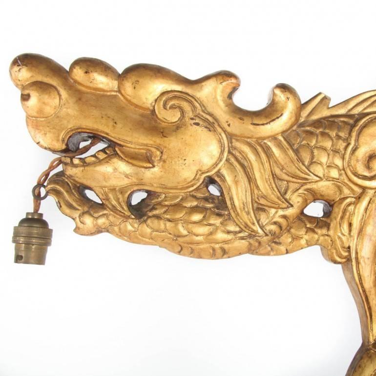 Chinese dragon lamp imported from France. Solid hand-carved wood with striking and ornate gilding. Original European wiring updated to North American standards.

