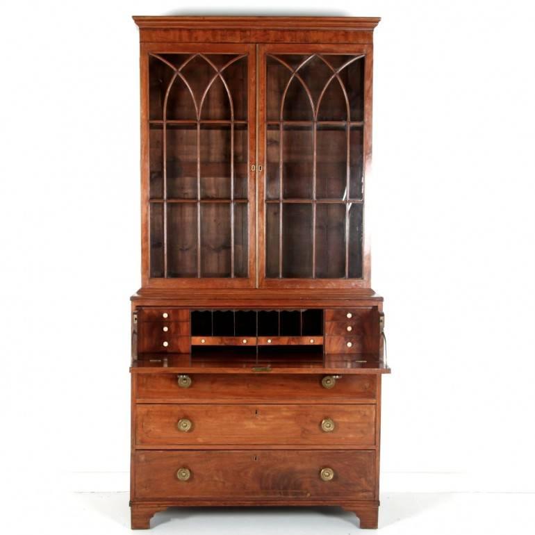 A fine George III mahogany English secretary or bookcase with ebony inlay and a nicely-fitted secretaire interior featuring ivory pulls. A gorgeous period piece, circa 1820.




  