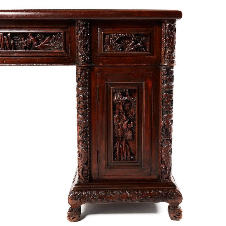 Chinese Export Antique Chinese Intricately Carved Hardwood Desk, circa 1910