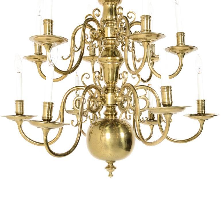 Large Dutch, solid brass, twelve-arm chandelier. This is an imposing piece that would be the centrepiece in a high--ceiling living room, dining room, or entrance area. Original North American wiring, circa 1950.





