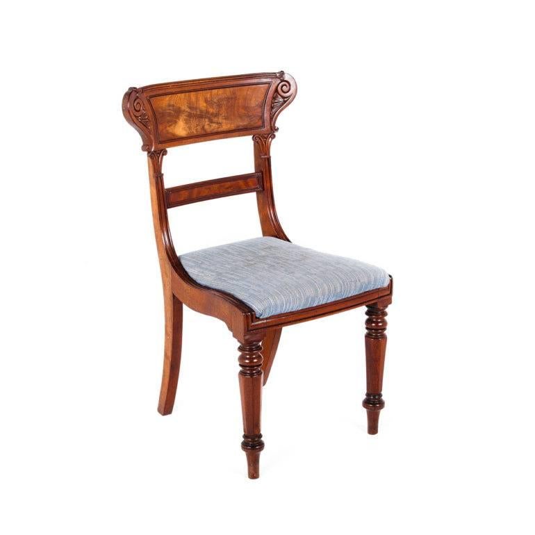 A set of six English William IV mahogany dining chairs, with unique matching flame-mahogany backs and unique scrolling. These chairs are solid as only the English could produce, are very comfortable, and are suitable for everyday use, circa