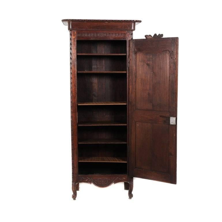 An attractive single-door ‘marriage armoire’ from Brittany, France. Solid dark oak, in great original condition, with whimsical carvings. Its shallow dimension makes it a candidate for many different locations in the home, circa 1880.



        